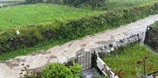 Torrential rain and 'ice flows' turn Teign Valley village into a river