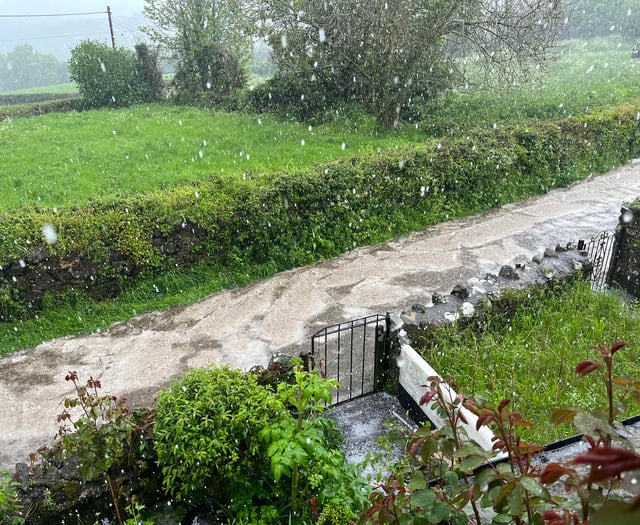 Torrential rain and 'ice flows' turn Teign Valley village into a river