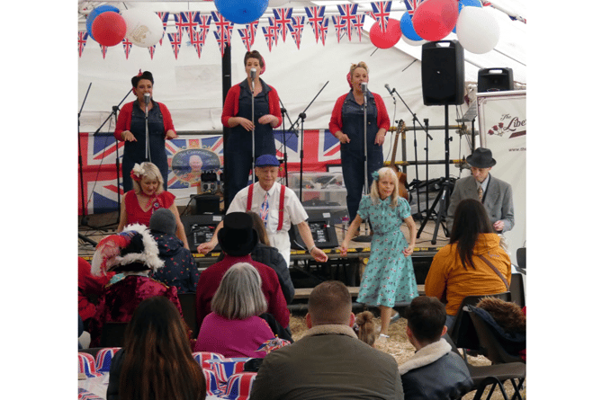 The Liberty Sisters performing in Kingsteignton for the town's Coronation celebrations