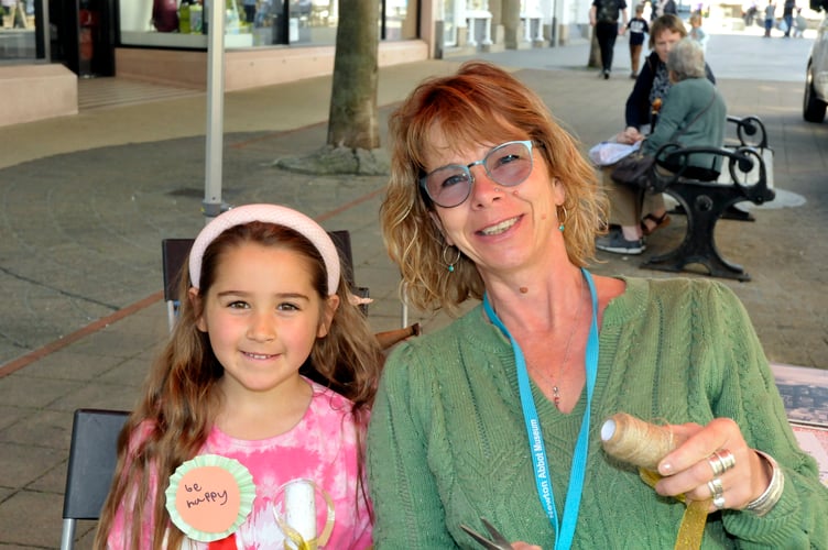 Six-year-old Primrose and Kate Green set about making some new laws for Newton Abbot