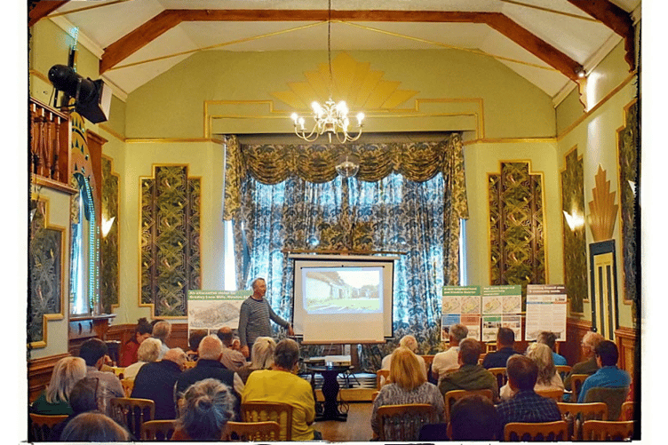 A packed meeting room at The Jolly Farmer
