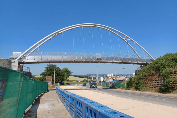 Foot and cycle bridge spanning A379 successfully lifted into place
