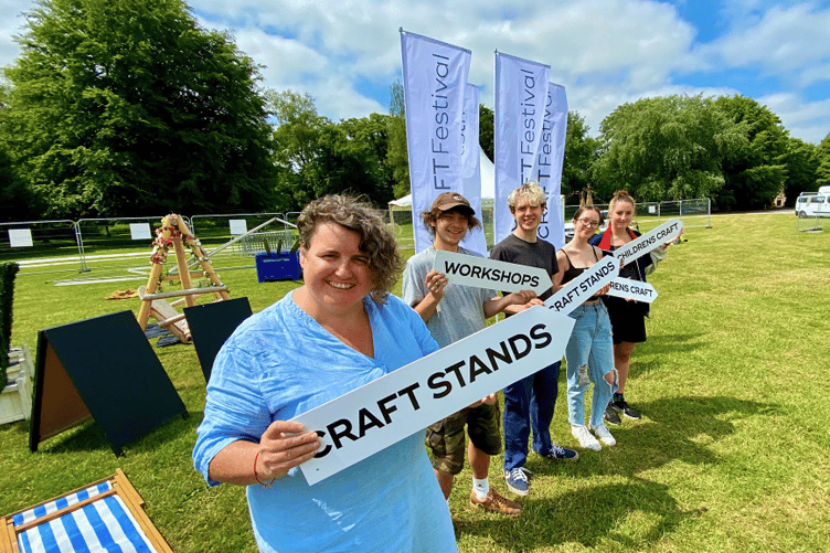 All signs point to...the Craft Festival. Festival director Sarah James with Sam Cox, Elliot Robillard Webb, LAurne Phillips and Matilda Pike putting the final pieces in place at the festival site in Bovey Tracey. The three -day event gets underway tomorrow (Friday).