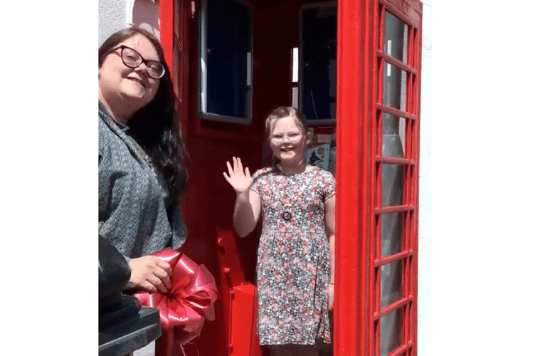 The red phone box in Queen Street was officially opened by the mayor of Dawlish Cllr Rosie Dawson and her consort, her daughter Kitty.