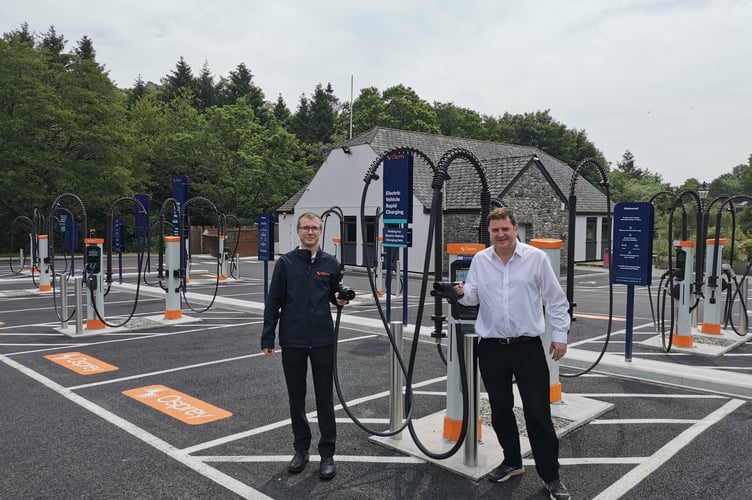 Mark Hall (Osprey Charging) with  Mel Stride MP  at Ospreys public EV charging hub in Salmons Leap Buckfastleigh