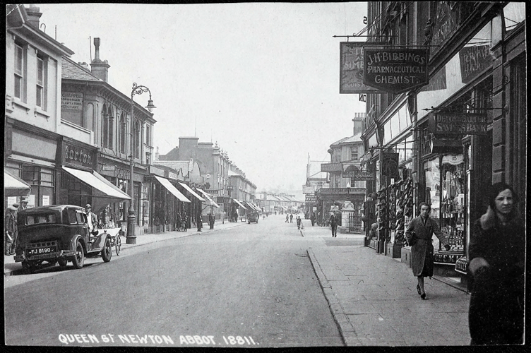 Queen Street, looking at J H Bibbings, Pharmaceutical Chemist, the pedestrian in the foreground is Mrs Christiana Ditchburn.