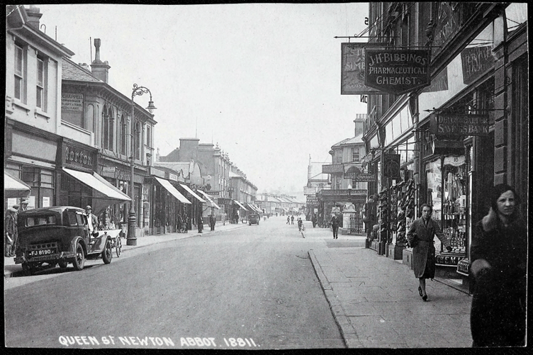 Queen Street, looking at J H Bibbings, Pharmaceutical Chemist, the pedestrian in the foreground is Mrs Christiana Ditchburn.