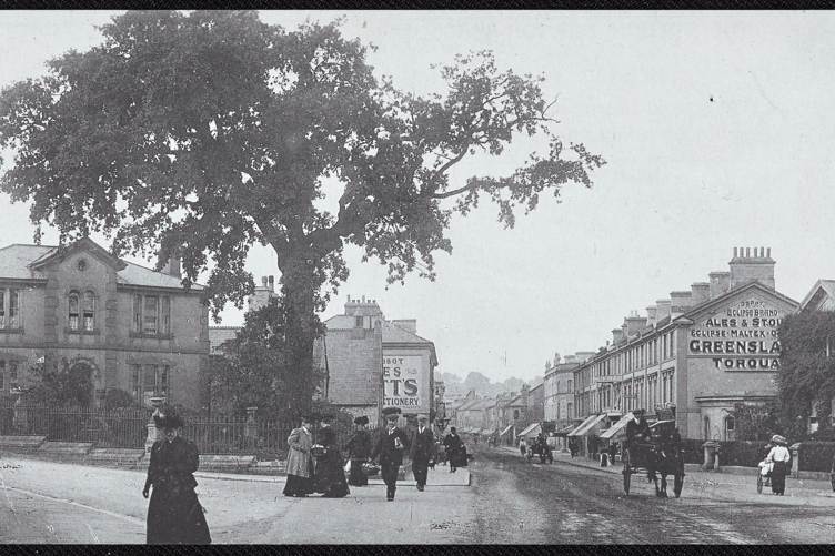 Queen Street and St Paul's Road showing Devon Villa with the Oak Tree that formerly stood on the site of the War Memorial. Also shown are a horse drawn vehicle and a number of pedestrians