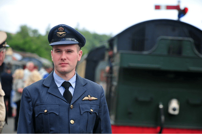 Pilot Officer Will Cartwright waits with rail warrant to his next posting.