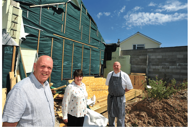 Bovey Paradiso at Bovey Tracey. Site of new cinema. Andrew Huckerby with Elizabeth and Mark Newton.