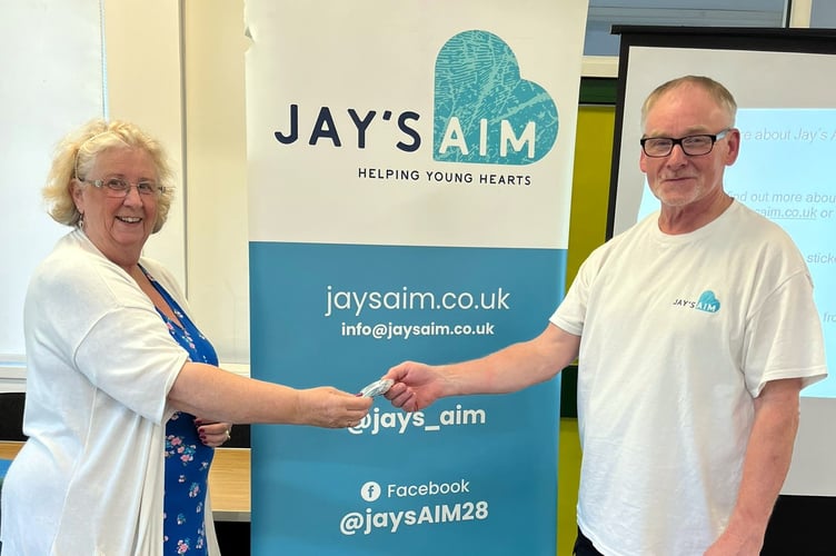 Karen Jenks, of Newton Abbot WI, welcomes Jim Conway from Jay's Aim.
Picture: Karen Jenks (7-7-23)