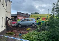 Man taken to hospital after car crashes into wall at Crediton flats