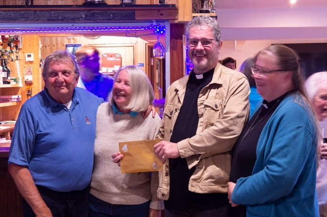 Frank & Carol Waister presenting cheque to St Nectan's Chuch Ashcombe