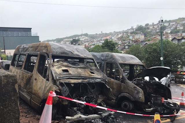 Two of the burned out minibuses