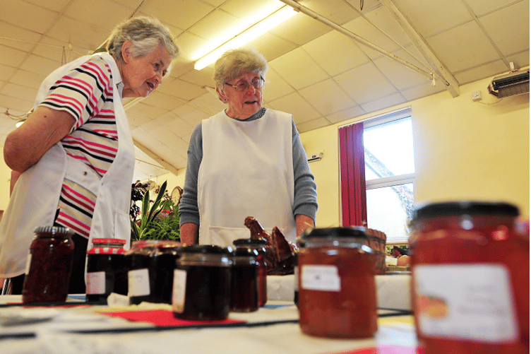 Baking and preserve entries come under the scrutiny of judges Sheila Ashford and Kathleen Vooght.