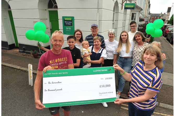 Steve Cornish presents Mel Whittock, Samarians’ Exeter, Mid and East Devon director, with the cheque for £10,000.