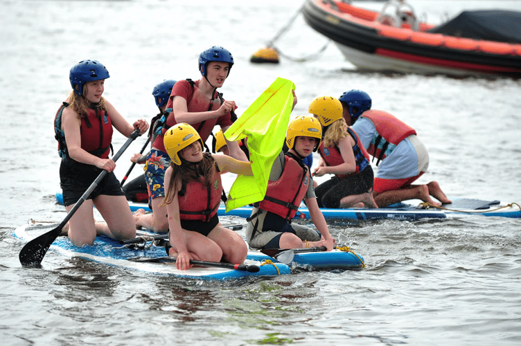 Competitors in the junior raft race event at Teignmouth Regatta