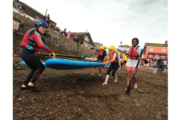 Competitors in the junior raft race event at Teignmouth Regatta