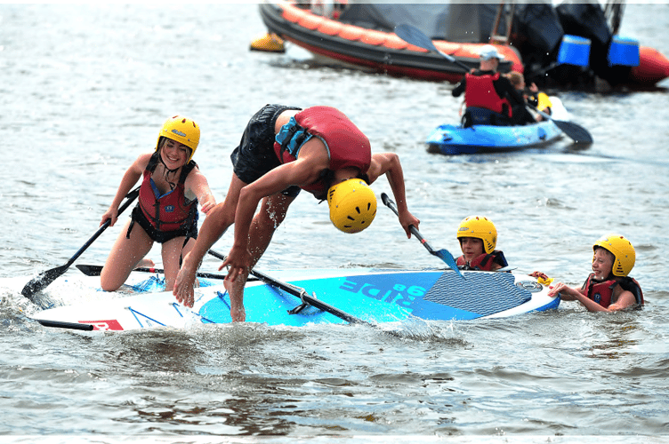 Competitors in the junior raft race event at Teignmouth Regatta