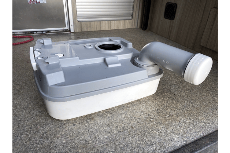 A typical toilet cassette used by campervan owners