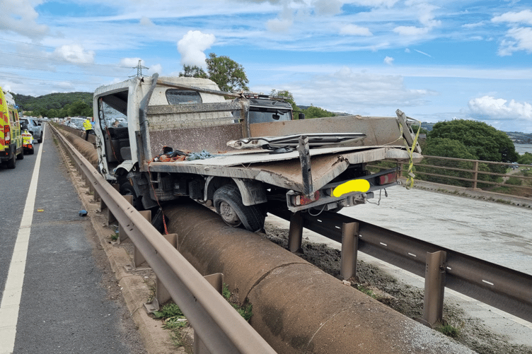 Fire crew rescue person trapped in van after A380 collision