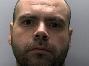 Hammer robber jailed after dreadlocks save shop assistant's life