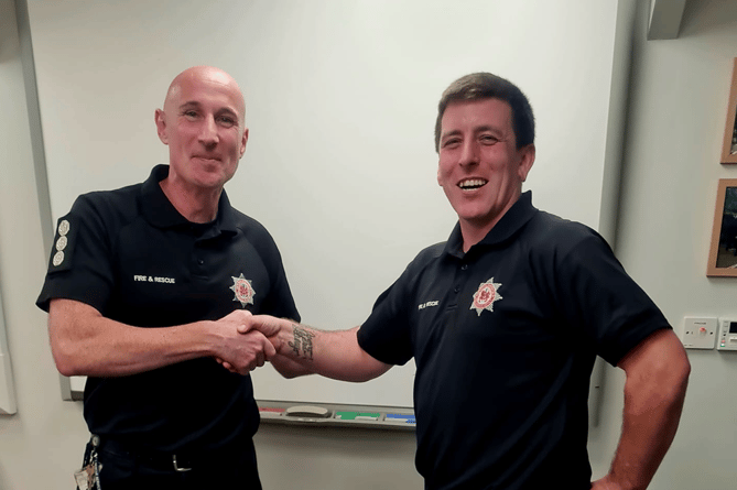 Jordan Reynolds, right, is now a fully competent firefighter with Buckfastleigh Fire Station