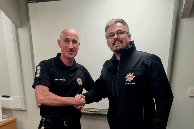 Karl Osborne, right, is now a fully competent firefighter with Buckfastleigh Fire Station