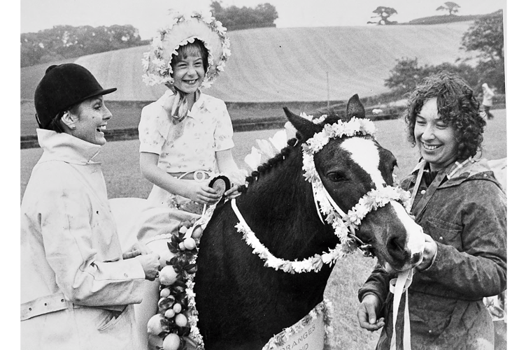 Annette Whittle and her daughter Tracey from Ashburton meet Angela Rippon who was on hand to judging fancy dress events at a local show in September 1981.