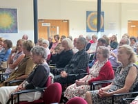 Broadcaster Dunant drops by Buckfast arts bash