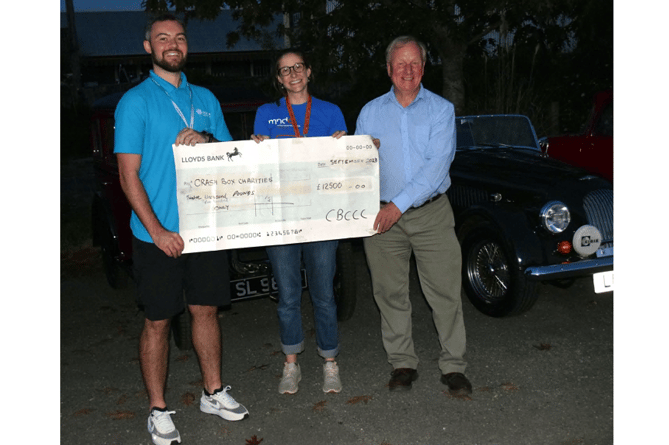 Jake Cawthorne from Hospiscare (Exeter), Helen Macke from the Motor Neurone Disease Association Torbay Group, and Mike Overfield Collins , President of the Crash Box and Classic Car Club