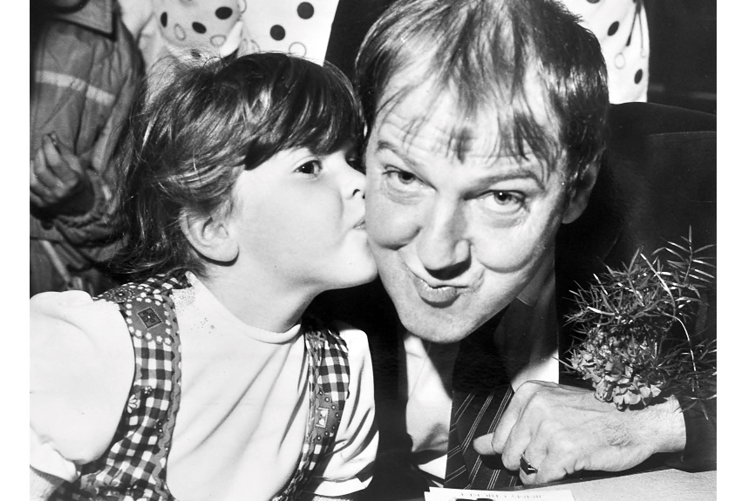 Langdon Hospital open day in Dawlish from August 1986. The event was opened by Irish comedian Jimmy Cricket, pictured here receiving a cheeky kiss from 4 year old Claire Baker.