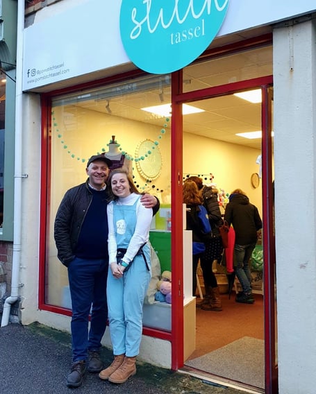 Emma outside her shop