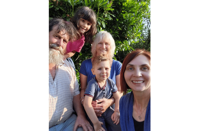 Russell Molyneux and Fiona Avis with Maryna Heoriieva and her two children, Emilia and Leon.