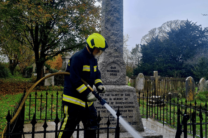 Buckfastleigh firefighters clean war memorial ahead of Remembrance Day