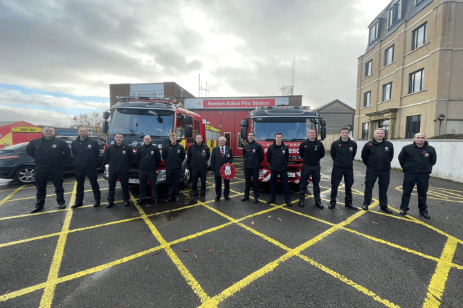 The crew of Newton Abbot Fire Station parading through the town to mark Remembrance Day