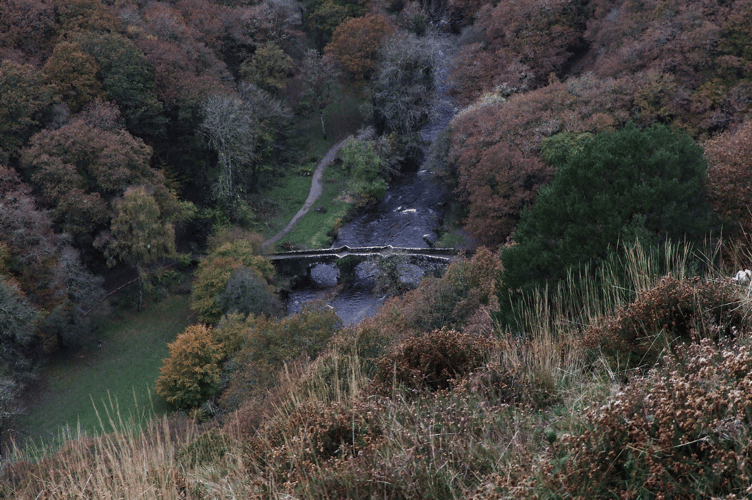Telephoto view from top of Prestonbury Castle, in rather cloudy conditions in November, so giving it all a dark, brooding appearance.