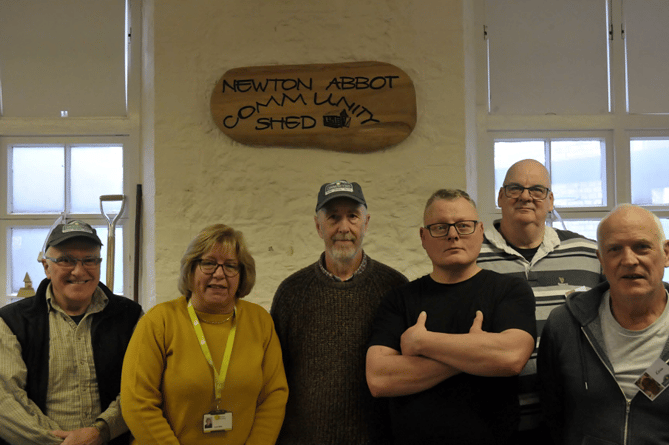 From left: Shed member Pete Stevens, Newton Abbot Library Manager Lynn West, Shed members Albert
Turner, Ollie Doughty, Tim Faulkner and Kevin Beard.