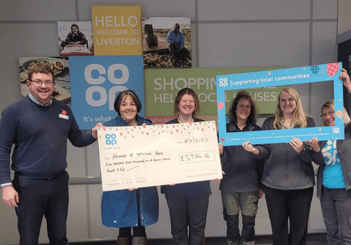 Friends of Stover Country Park being presented with a cheque for nearly £6,000 by Co-op Liverton