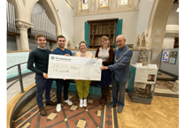 House builder presents Teignbridge museum with cheque worth thousands