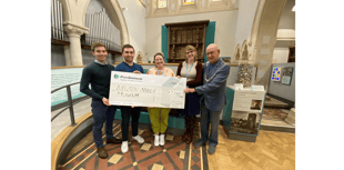 House builder presents Teignbridge museum with cheque worth thousands