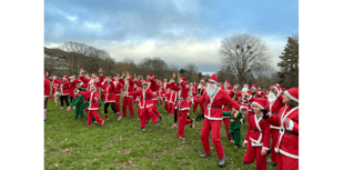 What’s that coming over the hill? Is it a Santa? Is it a Santa?