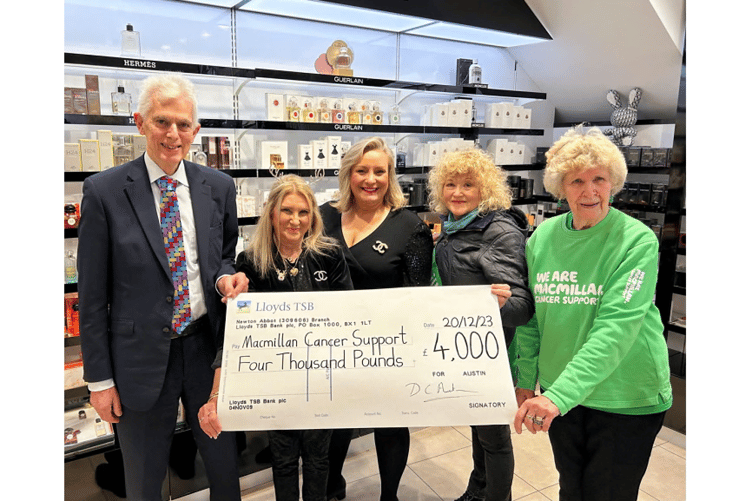 David Austin, Sharon Lobley, Sam Kenyon presenting Janet Greensmith and Joy Thomas from Macmillan Cancer Suport with the cheque for £4000.