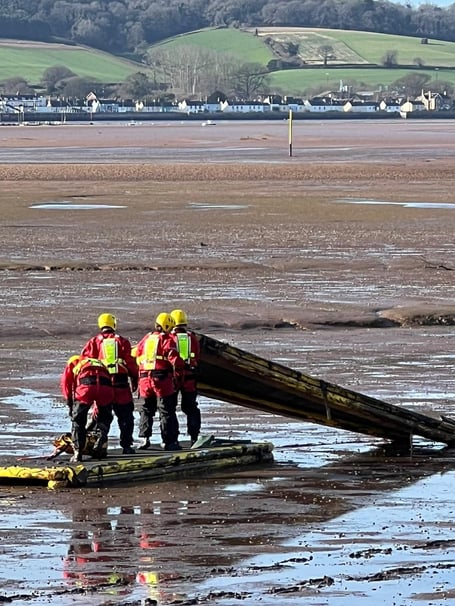 Firecrews come to the rescue of a person trapped in mud in the River Exe estuary
