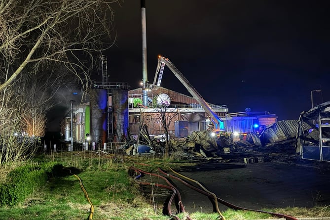 Fire crews at the scene of last night's fire at a derelict commercial property in Exeter  Photo:DanesCastleFireStation