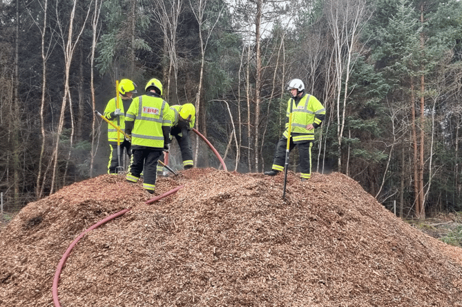 Pile of smoking wood chips sees Sunday action for Newton's firefighters 