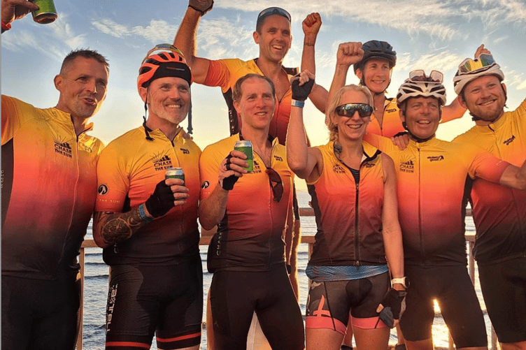 Having chased the sun, the team pose for a photo. From left to right: Paul Kelly, Glenn Alford, Stuart Simpson, Carl Williams, Claire McKenna, Tracey Elphick, Iain Grant and Steve Green