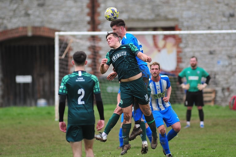 South Devon League football. Herald Cup clash with Newton Abbot 66 versus Buckfastleigh Rangers. Full time score of 3-1 in favour of 66.