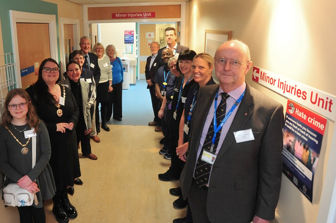 Official re-opening of the MIU at Dawlish Hospital.  Torbay and South Devon NHS Foundation Trust chairman Sir Richard Ibbotson (front right) with staff and guests at the MIU