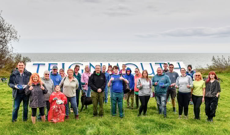 Volunteers repaint Teignmouth Letters